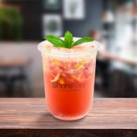 Strawberry Mojito · Strawberry flavored, with green tea and mint syrup, combined with a fresh lime slice and min...