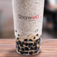 Milk Tea Ice Blended With Pearl · Ice cold drink with Okinawa flavor with pearls, creamy and sweet milk.