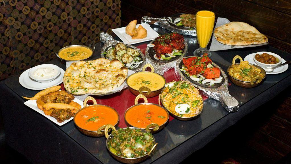 Taj Indian Restaurant · Indian · Seafood · American · Chicken · Vegetarian