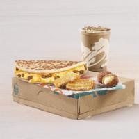 Bell Breakfast Box · Includes a Breakfast Flatbread Melt with sausage, two Cinnabon Delights®, a hash brown, and ...