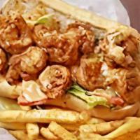 Grilled Shrimp Po Boy · Grilled shrimp with lettuce, tomato and grilled onion.
