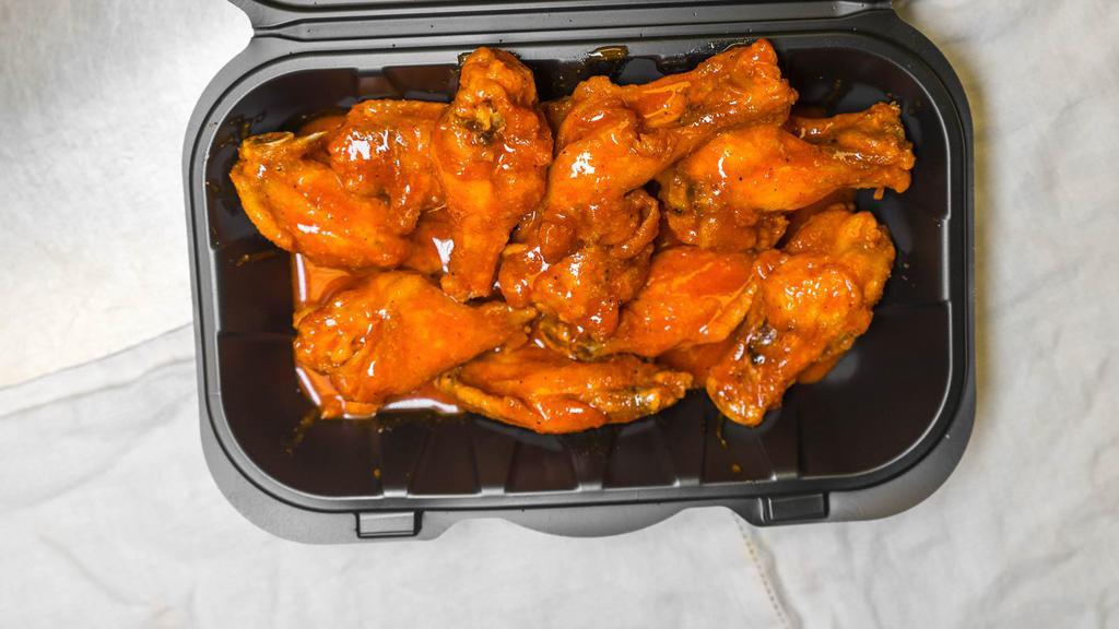 Buffalo Wings (10 Pcs.) · Served withcelery and one dressing per 10pc wings.