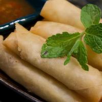 Harumaki Vegetable Spring Rolls · Crispy fried spring roll with cabbage, mushrooms, carrots, onions, green peas.