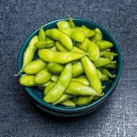 Edamame · Steamed edamame drizzled and tosses with yuzu salt.