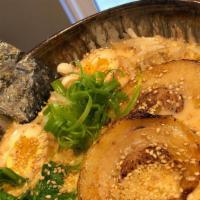Ultra-Spicy Tonkotsu Ramen · Spicy. Ramen noodles in a spicy tonkotsu broth with mushrooms, bok choy, bean sprouts, scall...