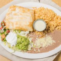 Sp 13. Chimichanga · With choice of rice or beans and salad.