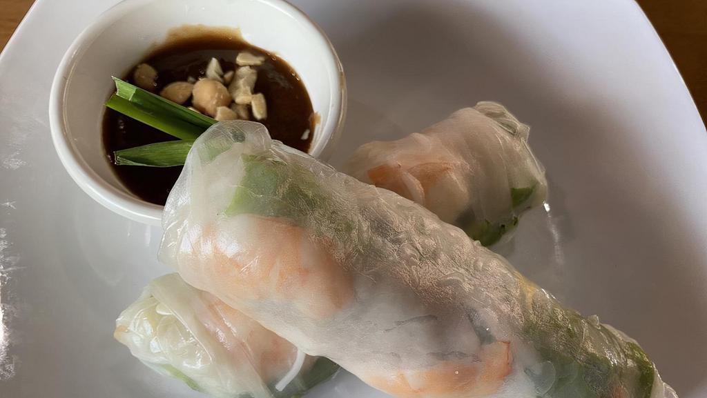 Fresh Summer Roll · Two pieces. Shrimp prawn, pork, lettuce, cucumber, beansprout, rice noodle, and basil wrapped in rice paper. Served with peanut sauce.