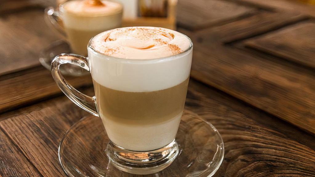 Macchiato · Macchiato, pronounced “mah-key-ah-toh,” literally means “marked” or “stained” in Italian. Traditionally, a caffé macchiato or an espresso macchiato is two shots of espresso with just a small amount of steamed milk that “marks” the espresso.