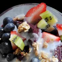 Tornado Bowl · Our 100% Premium Organic Soft Serve Acai is topped with: Coconut oil, strawberries, blueberr...