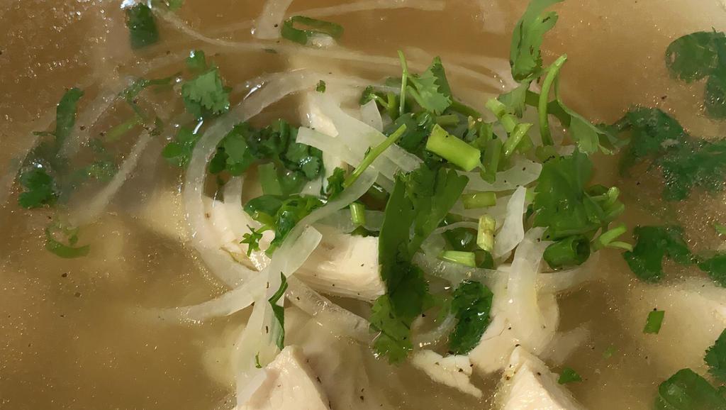 Chicken Pho · Vietnamese Chicken broth pho with chicken meat.  Comes with rice noodles, onions, scallions, cilantro.  Bean sprouts, basil, line, and jalapeno on the side.