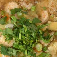 BúN TháI  · Thai hot and sour soup with onion, tomato, mushroom, bamboo, cabbage, herbs, and shrimp.  Ch...