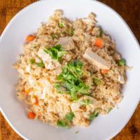 Com Chiên · Wok fried rice with egg and choice of chicken, beef, or shrimp.