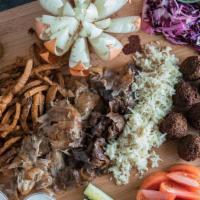 Shawarma Sampler · Whether you are trying Mr. Shawarma for the first time or you are a TRUE Mr. Shawarma fan wh...