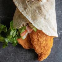 Chicken Schnitzel Wrap · Israeli style deep-fried chicken breast. This wrap comes 