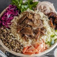 Beef & Lamb Shawarma Bowl · Sliced marinated beef steak spiced and slowly cooked on a vertical spit. “All the way” inclu...