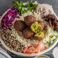 Falafel Bowl · Deep-fried ball made from chickpeas vegetables and spices. This bowl comes “all the way” as ...