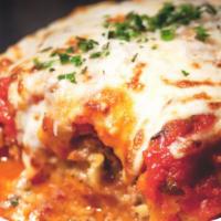 Lasagna · Mascarpone, ricotta, Parmesan, mozzarella, local ground beef and pancetta bolognese.