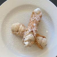 Traditional Cannoli · Two cannoli shells filled with ricotta, mascarpone and dark chocolate