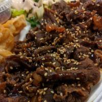 Korean Bulgogi Beef Bento Box · Served with white steamed rice, House ginger salad, Gyoza, 6 pieces California Roll
