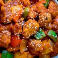 L-Sweet & Sour Chicken · Served with shrimp fried rice and plain fried wonton.
