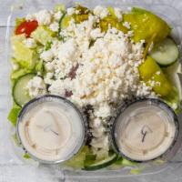 Greek Salad · The choice of dressings includes oil and vinegar italian thousand islands french caesar blue...