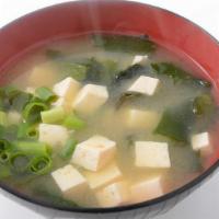 Miso Soup · Diced tofu, wakame, green onion in miso broth.