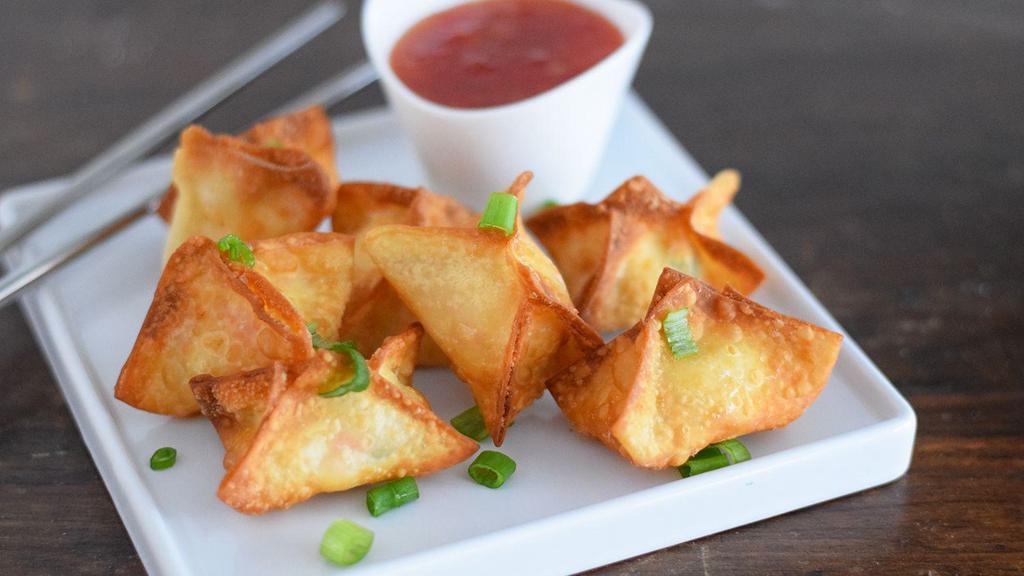 Crab Rangoon (5) · Cream cheese and crab filled in fried wontons.