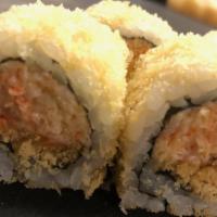 Crunchy Roll · Snowcrab rolled in crunchy. Topped with eel sauce and sesame seeds.