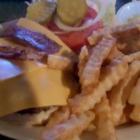Mopey'S Burger · 1/2 lb flame-grilled burger topped with bacon, lettuce, tomato, onion and American cheese