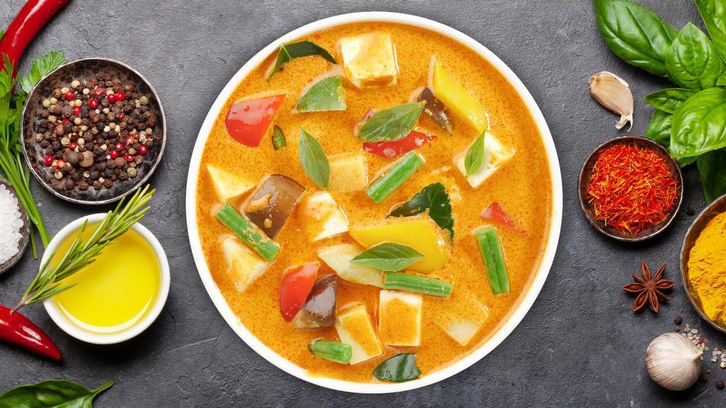 Massaman Curry · Bell peppers, onions, pineapple, mushrooms, potatoes, and massaman curry sauce.