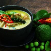 Green Curry · Medium Spicy. Bamboo shoots, eggplant, green beans, bell peppers and Thai basil with a green...