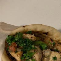 Chicken Shawerma · Grilled chicken with grilled green peppers and onions.