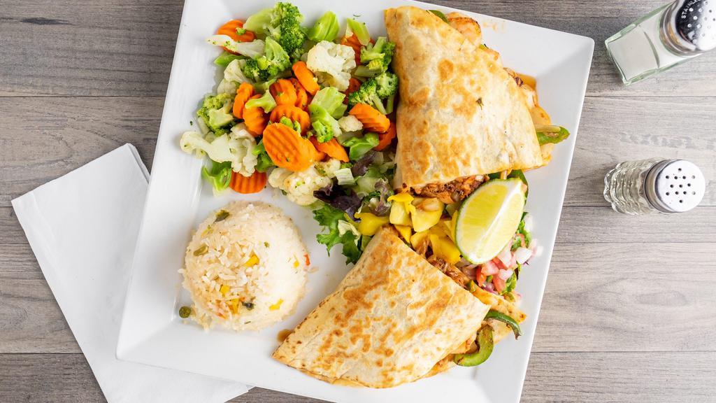 Quesadilla (1) · One grilled flour tortilla filled with your choice of shredded beef or chicken with rice, or beans with lettuce, and sour cream.