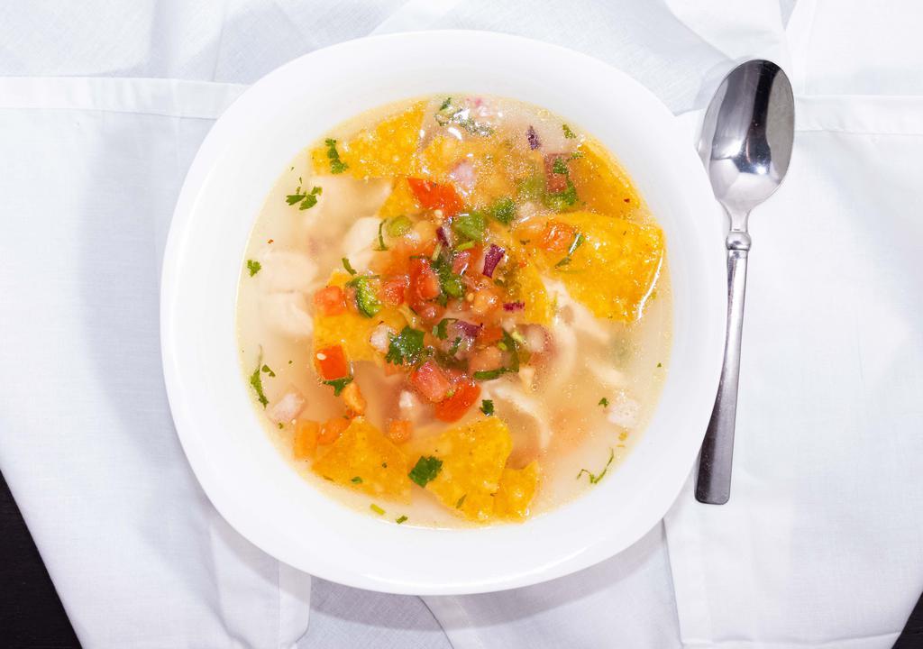 Chicken Soup · Mixture with onions, jalapenos, tomatoes, cheese, and chicken strips. Served with rice.