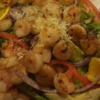 Grilled Shrimp Salad · Sixteen spicy grilled shrimp on a bed of lettuce with fried tortilla strips, avocado, tomato...