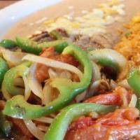 Steak Mexicano · T bone smothered with cooked onions, bell peppers, and tomatoes. Served with rice and choice...