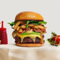 Wonderstruck Fries Vegan Burger · Seasoned Beyond beef patty topped with fries, avocado, melted vegan cheese, onion, lettuce, ...