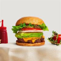 Avocado Vacancy Burger · Seasoned Beyond beef patty topped with avocado, melted vegan cheese, lettuce, tomato, onion,...