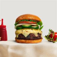 Sweet Carolina Vegan Burger · Seasoned quarter pound Beyond beef burger topped with chili, vegan cheese, and coleslaw. Ser...