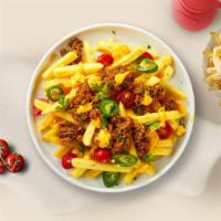 Chili Cheez Fries · Idaho potato fries cooked until golden brown and garnished with vegan American cheez sauce a...
