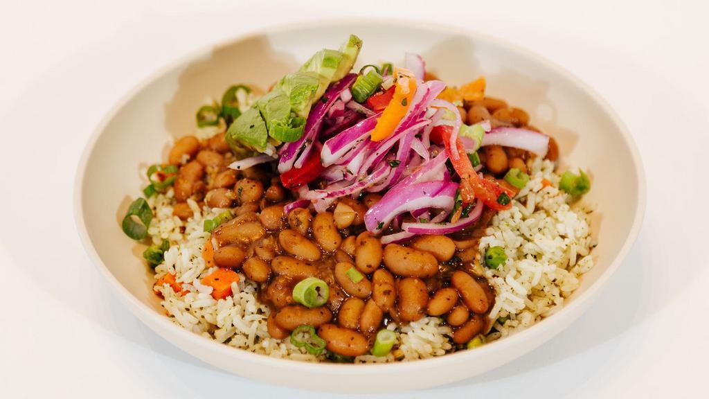 Tacu Bowl · Cilantro Infused or Jasmine Rice, Canary Beans, Salsa Criolla (Lime Marinated Onions and Tomatoes), Avocado, Green Onions.