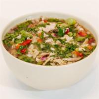 Sopa De Pollo · Pulled Rotisserie Chicken, Homemade Chicken Broth, Cilatro Infused Rice, Green Onions, Red O...
