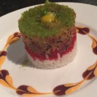 Tnt · Chopped Yellowtail Mixed with Crunchy & Tuna Mixed in a Delicate Layer of Black Tobiko, Wasa...