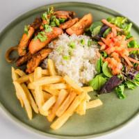 Pollo Saltado · Peruvian stir fry of chicken, tomatoes, onions, and cilantro. Served over French fries with ...