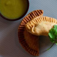 Empanadas · Please pick one of the following: General chicken, roasted poblano corn, red curry chicken, ...