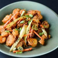 Heat Seeker Shrimp Appetizer · Fried shrimp tossed in a sweet and spicy sauce with julienned carrots and celery.