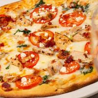 Chicken Florentine · our wood-roasted chicken, crumbled bacon, roma tomatoes, spinach, feta & mozzarella on an ol...