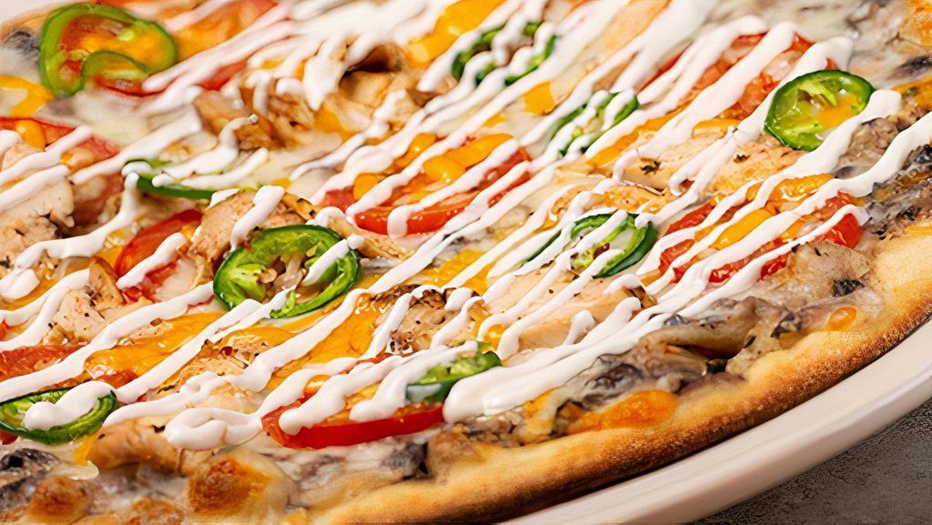 Mexican · black bean spread base with mozzarella and cheddar, wood-roasted chicken, roma tomatoes & sliced fresh jalapeños topped with sour cream