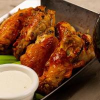 Garlic Rosemary Wings · our classic wings, marinated for 24 hours in rosemary and garlic and roasted to perfection i...