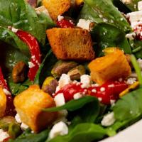 Spinach Salad · roasted red peppers, feta cheese, croutons & pistachios tossed with housemade fat-free honey...